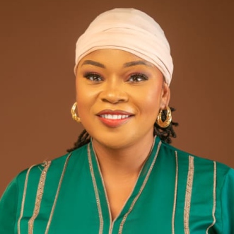 Headshot of Ms. Fidelia Agera, Founding Official of KCCIMA